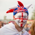 Football English fan with a painted English flag on his face at the World Cup Royalty Free Stock Photo