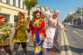 Game program of a group of clowns and buffoons on the street during a gastronomic festival