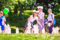 Children play outdoor chess in a park Royalty Free Stock Photo