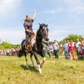 A demonstration of a Cossack girl on horseback for guests and spectators