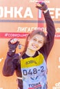 Portrait of dirty beautiful girls participating in the race of heroes to overcome difficult obstacles on a summer sunny day