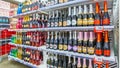 a large selection of sparkling wines in a large supermarket