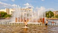 Children bathe in the fountain