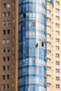 Washing the mirror facade of the building