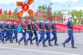 a military unit of airborne paratroopers in parade uniform with a flag marching along the Kuibyshev Square. Spring sunny day. Vic Royalty Free Stock Photo