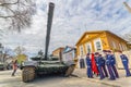 New military modified russian army main battle tank T-72B3M in green camouflage at the city street