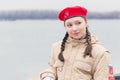 A girl detachment of young soldiers on the embankment