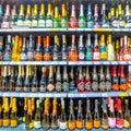 A wide selection of champagne and wine in the department of alcoholic beverages in the supermarket.