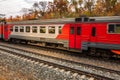 electric train cars racing along the railway