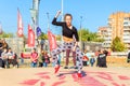 Youth street dances. A young girl performs dance moves Royalty Free Stock Photo