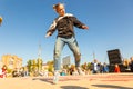 Youth street dances. A young girl performs dance moves Royalty Free Stock Photo