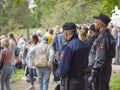 Police on the protection of law and order. A large gathering of people in the open air