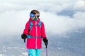 Russia, Sheregesh 2018.11.17 Professional woman skier in pink sp Royalty Free Stock Photo