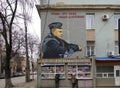 Russia, Simferopol. 2019 January 01: Color graffiti portrait of Russian President Vladimir Putin on a street wall in military