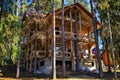 Russia, Siverskaya - October 15, 2023: Wooden house made of beams in the forest