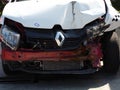 Russia, Sochi 15.05.2021. Fragment of a crashed white taxi car standing on the asphalt. Front view. Auto after road