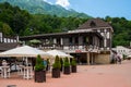 RUSSIA, SOCHI - JULY 12, 2020: McDonald's in Krasnaya Polyana Roza Khutor, in the resort against mountains,