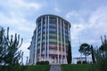 Rainbow building of comfortable three-star Tulip Inn Omega hotel on the Olympic Avenue of Imereti lowland on a cloudy summer eveni
