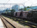Russia, Sochi18.07.2020. A long freight train with different wagons stands at the railway station