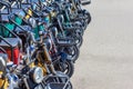 Russia, Sochi 14.05.2022. Multi-colored electric bikes with headlights and baskets stand in a row on an asphalt road on Royalty Free Stock Photo