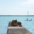 Russia, Sochi 12.06.2022. Preparing fireworks by the sea. Girls on sup board. Festive fireworks, pyrotechnics Royalty Free Stock Photo