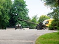 Russia, Sochi 01.07.2020. Rare military cannons and an ambulance stand on the square surrounded by green trees