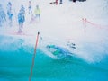 Russia, Sochi 11.05.2019. Snowboarding water competition splashing girl in a swimsuit in the ski resort Gorki-gorod. Royalty Free Stock Photo