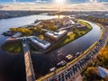 Russia, St. Petersburg, Aerial landscape of Peter and Paul cathedral at sunset, walls of fortress, Golden autumn