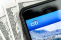 RUSSIA, ST.PETERSBURG, April 4, 2019: Logo Citigroup Inc in the smartphone lying dollar bills Royalty Free Stock Photo