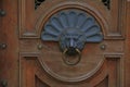 Russia, St. Petersburg, architectural details, an element of a wooden door, a metal handle in the form of a lion Royalty Free Stock Photo