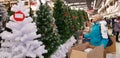 Artificial Christmas trees in the store on sale