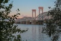 Russia, St. Petersburg, dawn over the Neva River in summer. View of an unusual bridge. A gentle dawn morning. A sensual dawn, an e