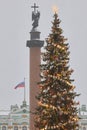 Russia, St. Petersburg, 30 December 2023: The main Christmas tree shimmers with decorations, Alexander column with angel