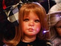 Russia, St. Petersburg - December 20, 2023: Vintage girl doll close-up in a souvenir shop