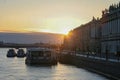 Russia, St. Petersburg, The delightful golden sun, the sun`s rays over the Neva River. View of the Palace embankment and the sight