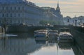 Russia, St. Petersburg, early morning on the Moika River. Gentle blue light, the sun in a haze, a wonderful atmosphere. Bridge, to