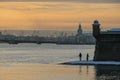 Russia, St. Petersburg, early morning on the Neva River, gentle golden sunrise, early winter. Peter and Paul Fortress, water, ship Royalty Free Stock Photo