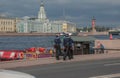 Russia, St. Petersburg, the embankment of the river in summer, tourist boats, sailors on the embankment, textured architecture ill