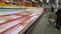 Empty shelves with meat in the supermarket due to the coronovirus epidemic