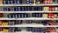 Half-empty shelves with pasta due to coronovirus in a supermarket