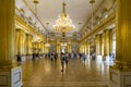 Hall with golden columns.