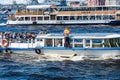 Russia, St. Petersburg, July 2020. Passenger ships with people on the Neva River.