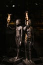 Russia, St. Petersburg - March 10, 2023: Black figurines of men in the Museum of Ancient Egypt