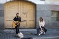 Russia St. Petersburg Palace Square May 7 2022 Two young girls street musicians perform on the street of the city