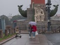 Russia, St. Petersburg in the summer in the rain. A rainy gray cloudy city. View of the sights. Arrow of Vasilievsky Island, sculp