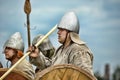 Russia, Staraya Ladoga 23,06,2012 Reenactors with shields and spears during the battle, Festival of Historical Reconstruction of