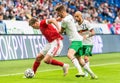 Russia striker Alexander Sobolev against Bulgaria players Andrea Hristov and Momchil Tsvetanov during international friendly Royalty Free Stock Photo