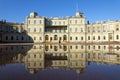 Russia, suburb of St. Petersburg. Great Gatchina Palace 1766 - 1781 and parade-ground. Reflection in pools after a rain