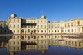 Russia, suburb of St. Petersburg. Great Gatchina Palace 1766 - 1781 and parade-ground. Reflection in pools after a rain