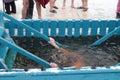 01.19.2020, Russia, Syktyvkar. People bathes in ice hole during the baptismal holiday. Russian orthodox religious rite